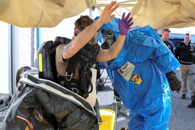 U.S. Army Sgt. Kyle Clark with the Pennsylvania National Guard’s 3rd Weapons of Mass Destruction Civil Support Team undergoes decontamination after investigating potential simulated hazards Feb. 2 at Sysco of Central Pa. in Harrisburg, Pa. The 22 Soldiers of the CST simulated being called upon by civilian authorities to investigate and respond to potential drug production laboratories in preparation for an upcoming external evaluation. (U.S. Army National Guard photo by Sgt. 1st Class Zane Craig)