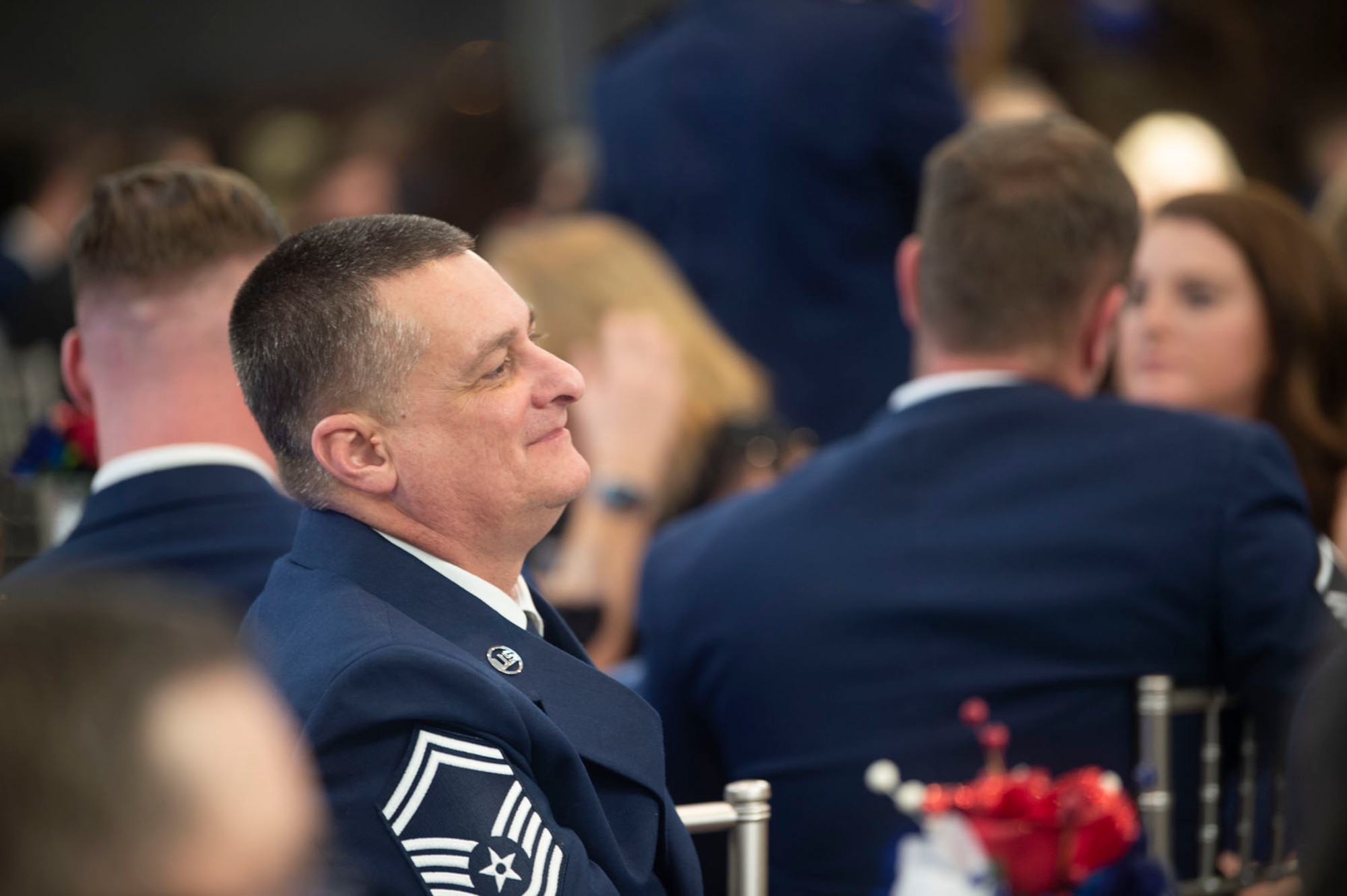 Senior Master Sgt. Mike Johnting, 434th Maintenance Squadron, looks on during the 80th Anniversary Ball program. The wing celebrated both the unit, and the base's long history and announced its annual award winners. Photo by Master Sgt. Rachel Barton.