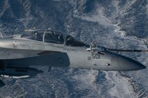A Royal Air Force Typhoon FGR4, receives air-to-air refueling from a Voyager during a Red Flag-Nellis 23-1 mission over the Nevada Test and Training Range, Jan. 26, 2023.