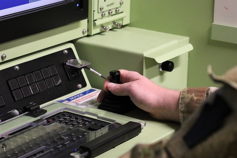 U.S. Army Spc. Hunter Seaborg, a UAS operator with Delta Company, 103rd Brigade Engineering Battalion, 56th Stryker Brigade Combat Team, 28th Infantry Division, flies an RQ-7 Shadow on a simulator at the Unmanned Aircraft System Operations Facility at Fort Indiantown Gap, Jan. 30, 2023. (U.S. Army National Guard photo by Capt. Travis Mueller)