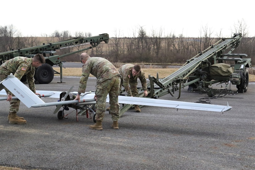 U.S. Soldiers with the 28th Infantry Division prepare an RQ-7 Shadow for flight at the Unmanned Aircraft System Operations Facility at Fort Indiantown Gap, Jan. 30, 2023. (U.S. Army National Guard photo by Capt. Travis Mueller)