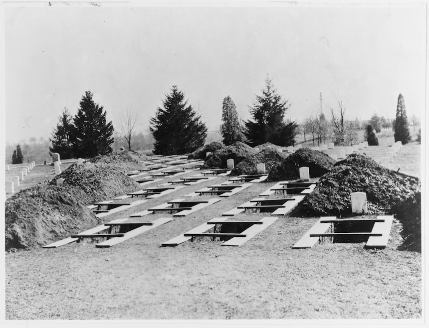 Graves prepared in Arlington National Cemetery, Washington, D.C. to receive the men killed in the USS MAINE at Havana Harbor, Cuba.