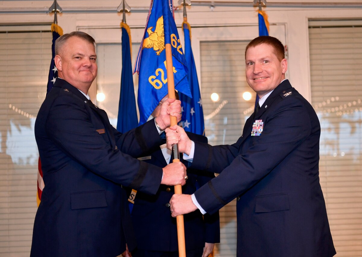 Brig. Gen. Scott Durham, 4th Air Force commander, gives Col. Brandon W. Stepp command of the 624th Regional Support Group (RSG) during an assumption of command ceremony at Joint Base Pearl Harbor-Hickam, Hawaii, Feb.4, 2023.