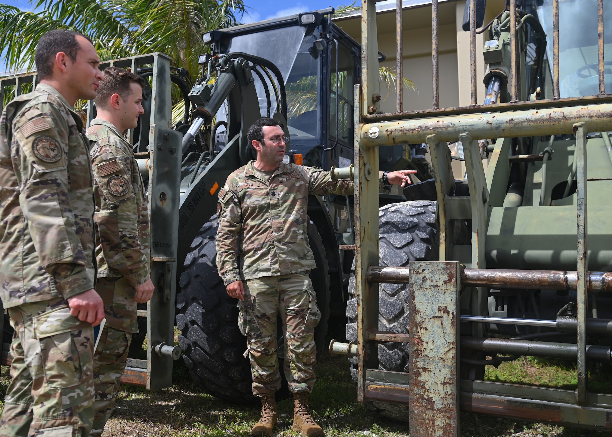 U.S. Air Force Lt. Col. Steve Smith, the commander of the 36th Contingency Response Squadron, does a walk-through of the 36th CRS with Project Arc members visiting Andersen Air Force Base, Guam, Jan. 30th, 2023. These three members come from various Air Force Specialty Codes, but all yield a personal background in engineering, and are the first Project Arc cohort to enter the Pacific Air Forces. The three-member team will spend six months among three bases in the region, but more than half of their time will be here with the 36th Wing. (U.S. Air Force photo by Staff Sgt. Aubree Owens)