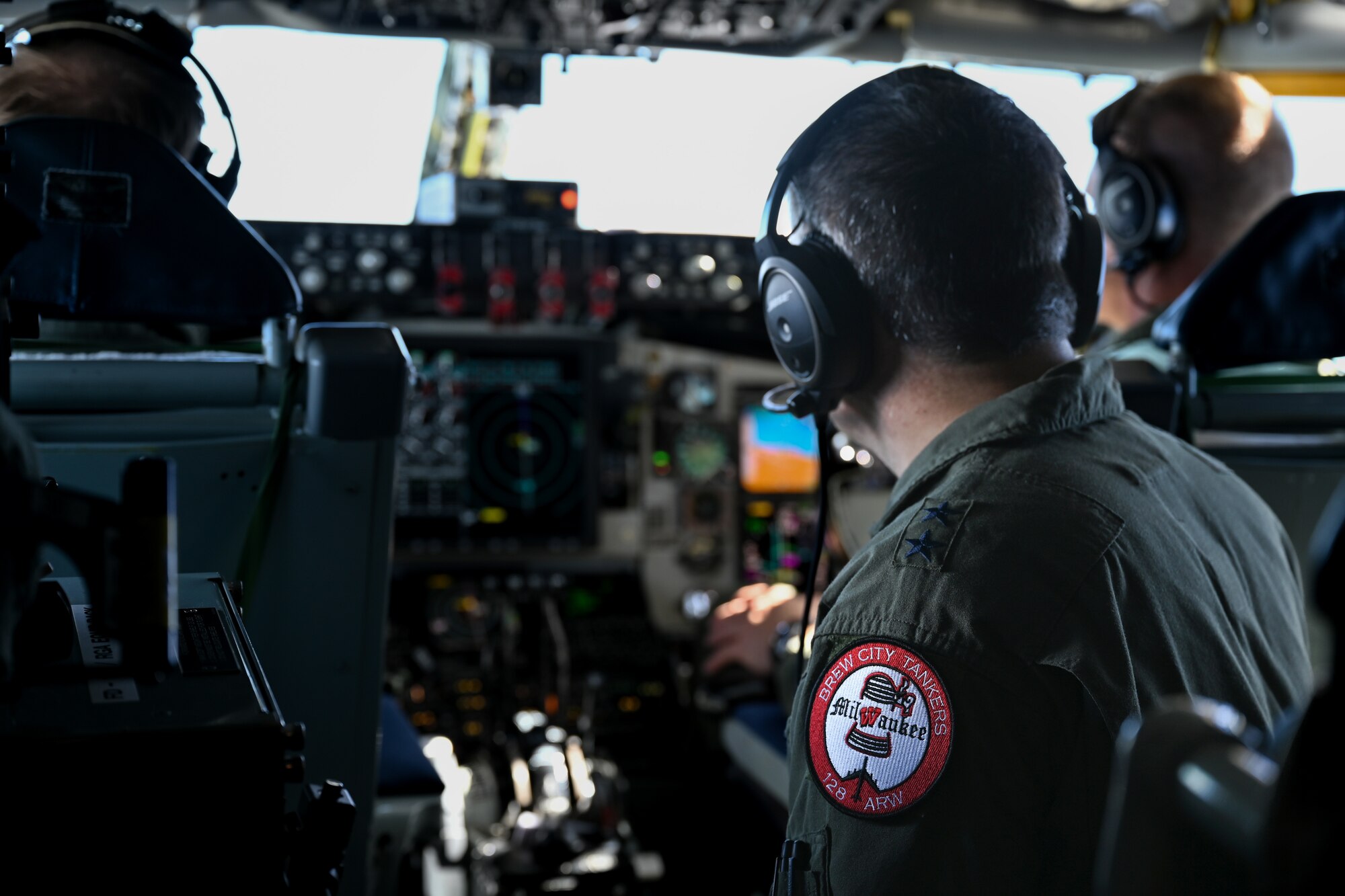 U.S. Air Force Maj. Gen. Paul Knapp, adjutant general of the Wisconsin Air National Guard, watches as flight crew prepare for landing at Andersen Air Force Base, Guam, Feb. 3, 2023.