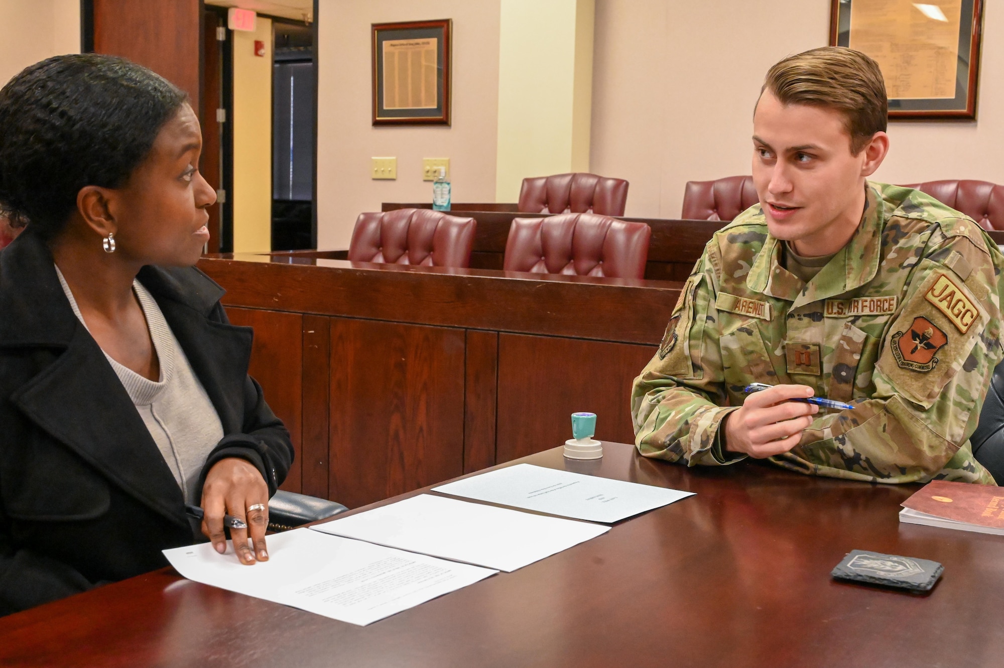 Airman 1st Class Ashley Smith, 97th Wing Staff Agencies judge advocate (JA) civil law paralegal, uses a stamp to notarize a document at Altus Air Force Base (AAFB), Oklahoma, Feb. 2, 2023. A notary legalizes a document and is a service provided at AAFB’s JA office. (U.S. Air Force photo by Senior Airman Kayla Christenson)