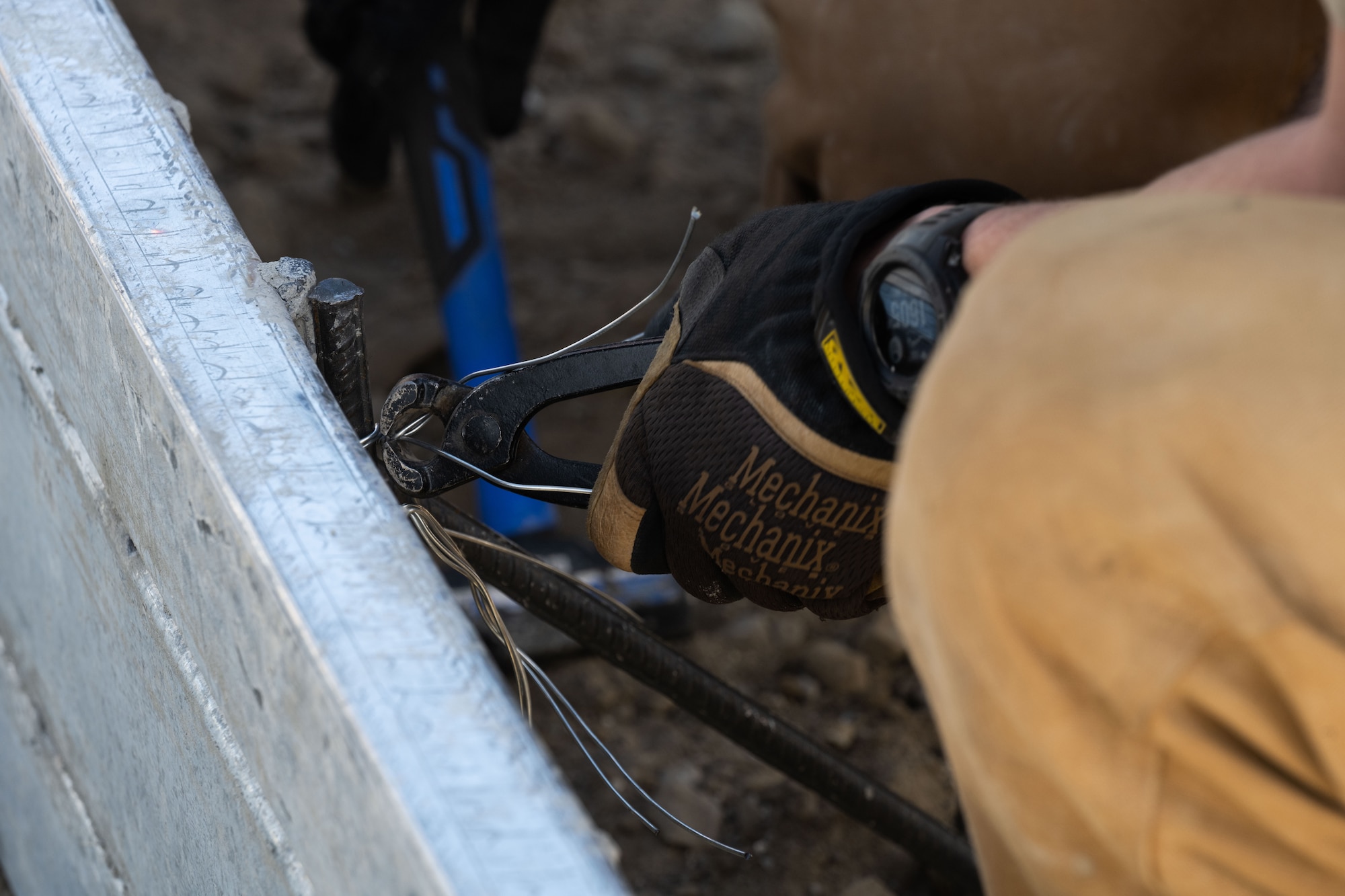 An Airman with the 819th RED HORSE Squadron out of Malmstrom Air Force Base, Montana, assembles forms to pour concrete as part of a Field Training Event at Basa Air Base, Philippines, January 25, 2023. The training event allowed both units to exchange knowledge and best practices in pouring a concrete pad which will be used as a future training site for airfield damage repair. (U.S. Air Force photo by Tech. Sgt. Hailey Haux)