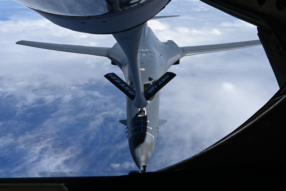 A U.S. Air Force B-1B Lancer flying in support of a Bomber task Force mission, attaches to the boom of a U.S. Air Force KC-135 Stratotanker over the Pacific Ocean, Feb. 3, 2023.