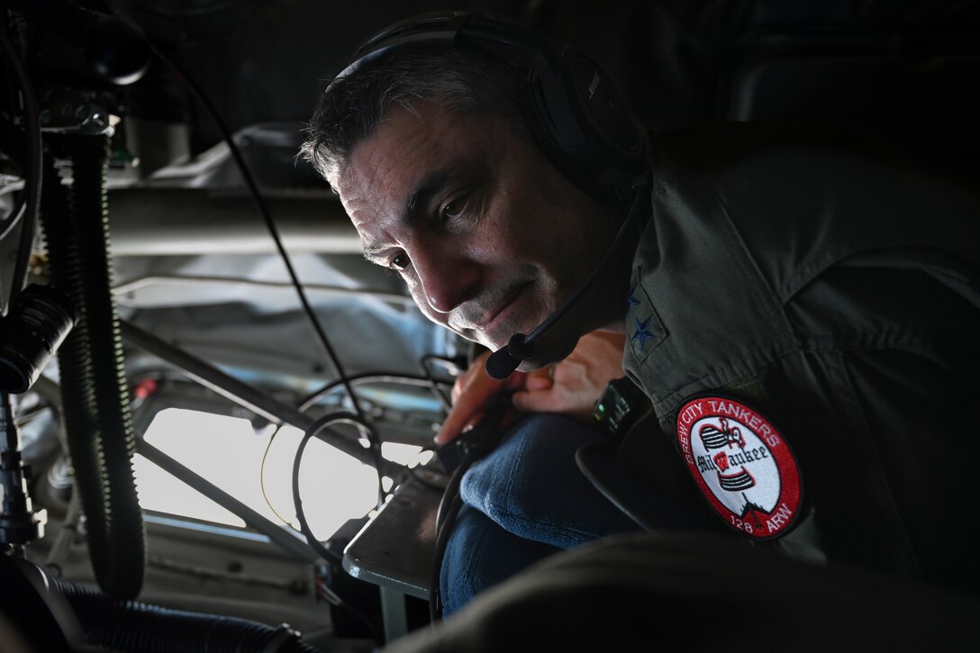 U.S. Air Force Maj. Gen. Paul Knapp, adjutant general of the Wisconsin Air National Guard, watches a B-1 during aerial refueling Feb. 3, 2023.