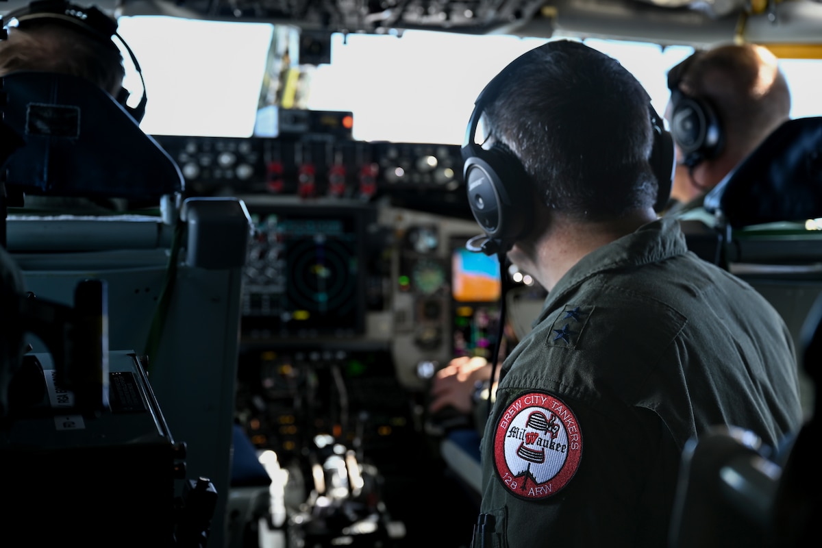 U.S. Air Force Maj. Gen. Paul Knapp, adjutant general of the Wisconsin Air National Guard, watches as flight crew prepare for landing at Andersen Air Force Base, Guam, Feb. 3, 2023.
