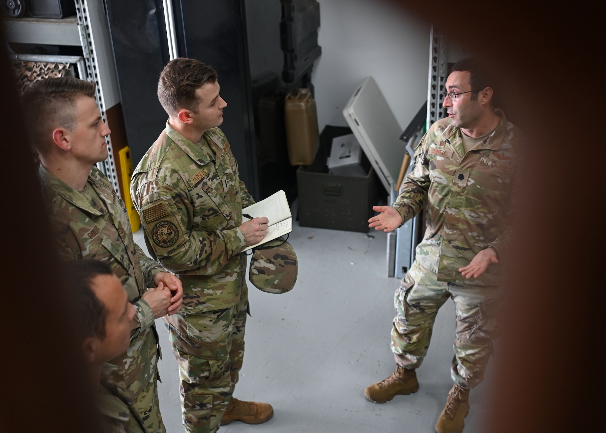 U.S. Air Force Lt. Col. Steve Smith, the commander of the 36th Contingency Response Squadron, does a walk-through of the 36th CRS with Project Arc members visiting Andersen Air Force Base, Guam, Jan. 30th, 2023. These three members come from various Air Force Specialty Codes, but all yield a personal background in engineering, and are the first Project Arc cohort to enter the Pacific Air Forces. The three-member team will spend six months among three bases in the region, but more than half of their time will be here with the 36th Wing. (U.S. Air Force photo by Staff Sgt. Aubree Owens)