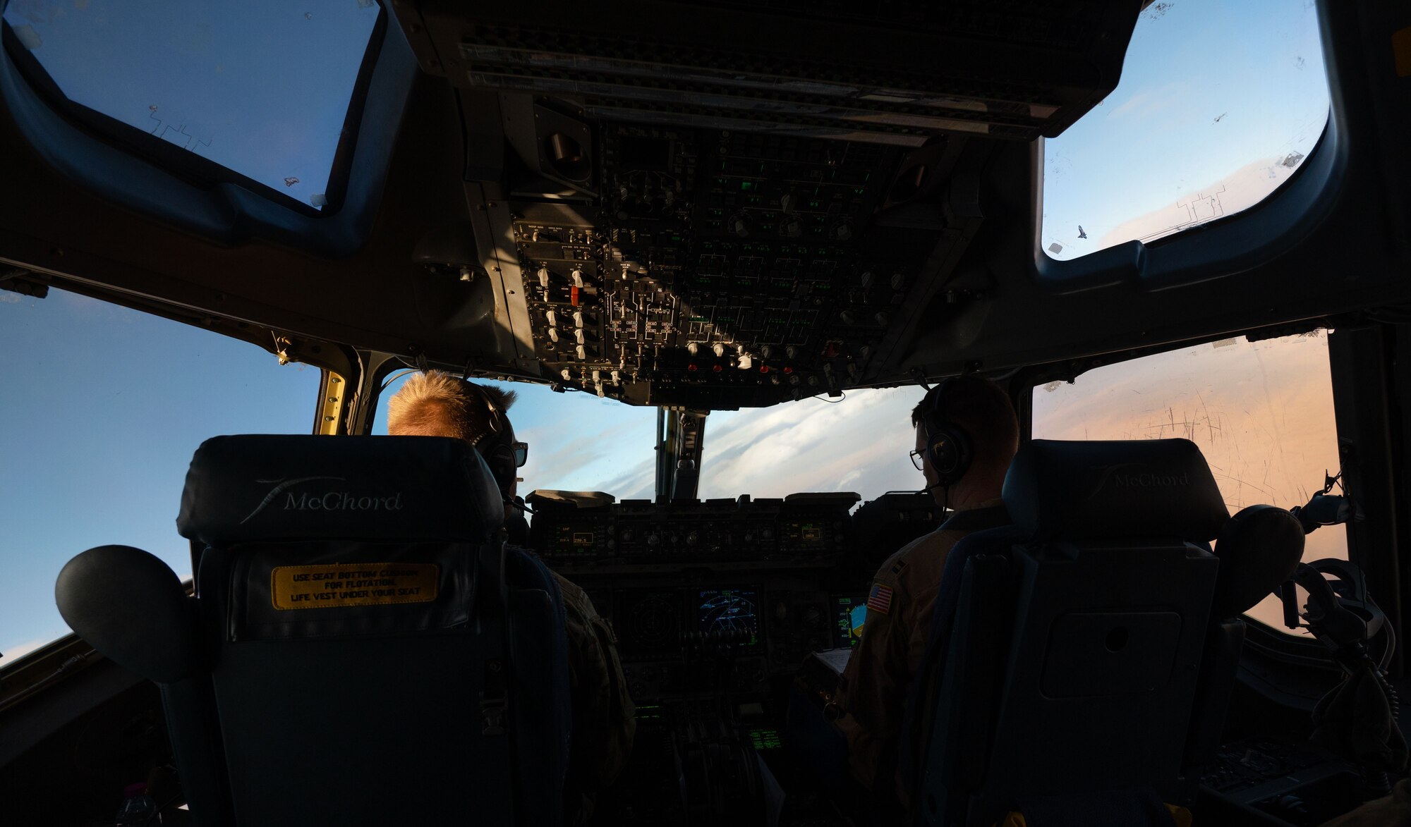 Photo of a pilots flying in a C-17