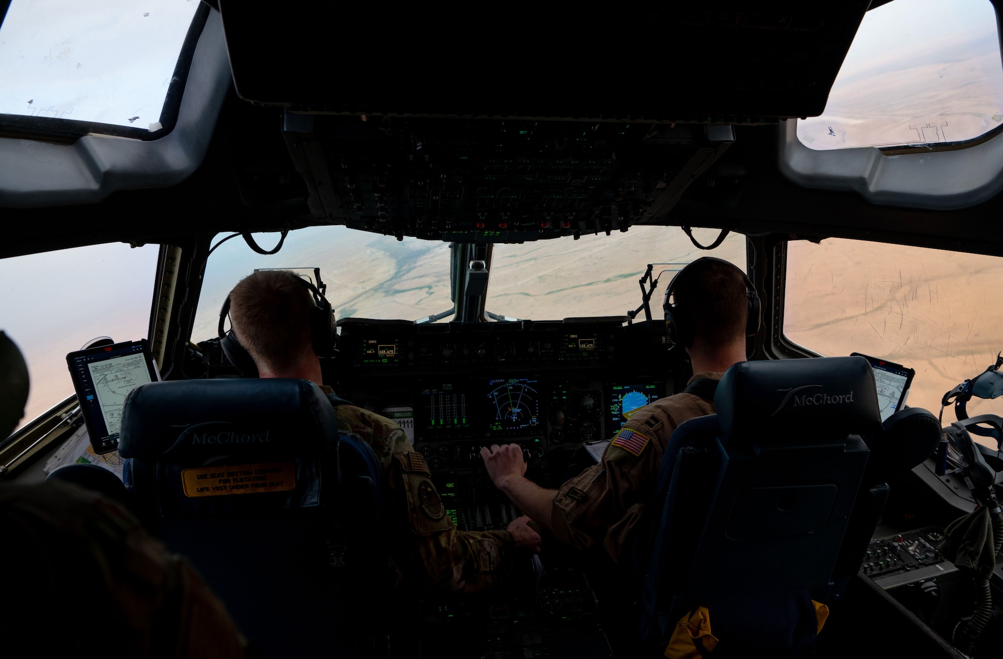 Photo of a pilots flying in a C-17