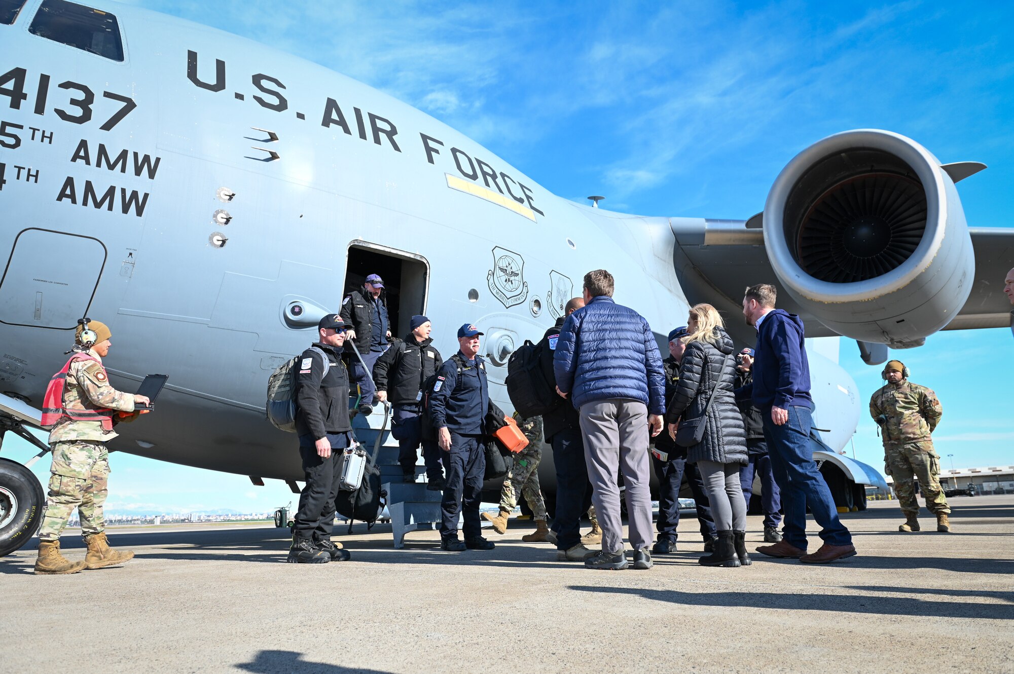 Members of the United States Agency for International Development’s Disaster Assistance Response Team arrive at Incirlik Air Base, Türkiye, Feb. 8, 2023. The DART is assigned to lead the U.S. government humanitarian response following a series of earthquakes that struck central-southern Türkiye on Feb. 6, 2023.