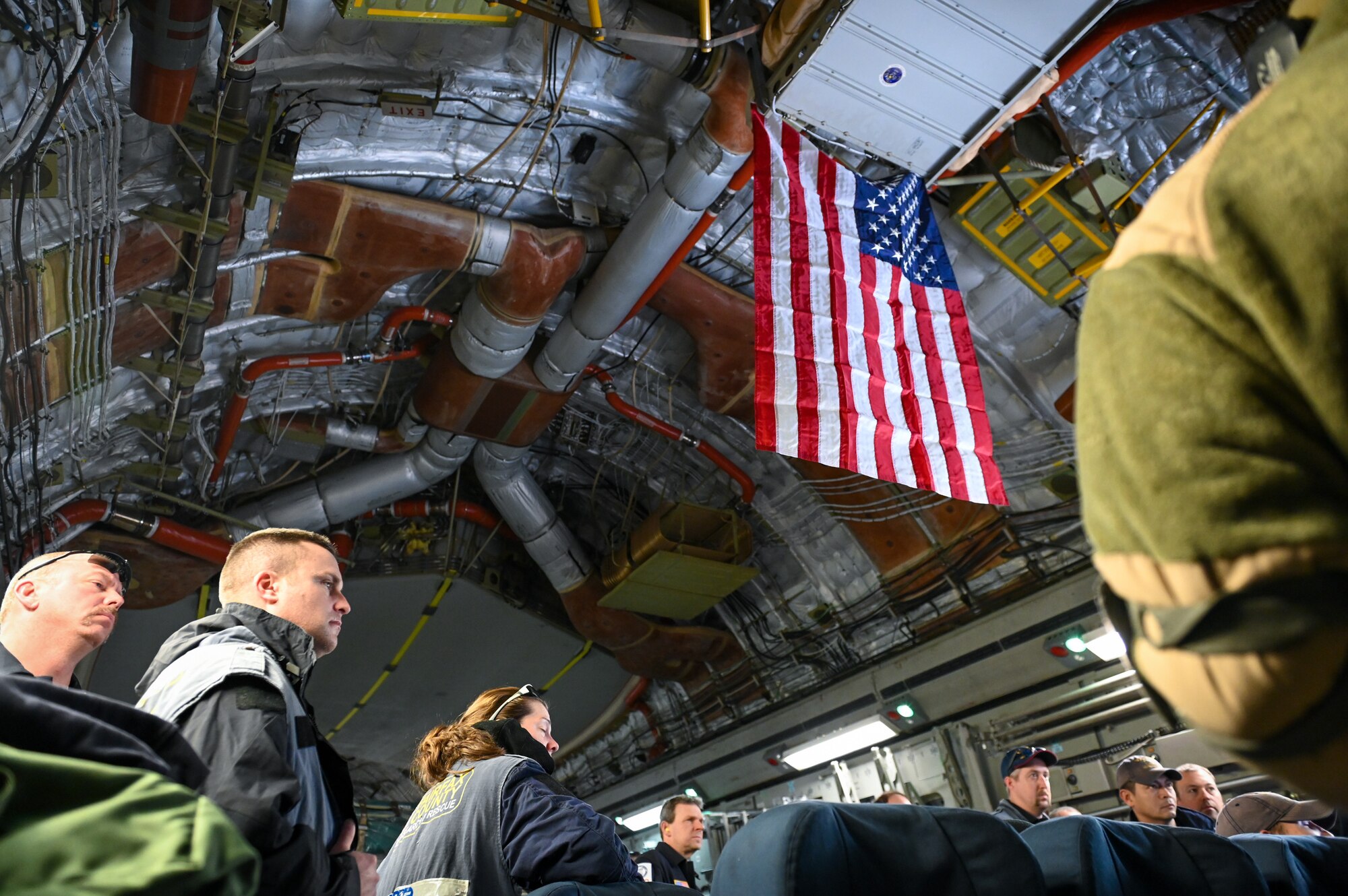 Members of the United States Agency for International Development’s Disaster Assistance Response Team wait to deplane at Incirlik Air Base, Türkiye, Feb. 8, 2023. The DART is assigned to lead the U.S. government humanitarian response following a series of earthquakes that struck central-southern Türkiye on Feb. 6, 2023.