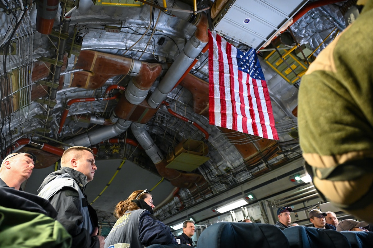 Members of the United States Agency for International Development’s Disaster Assistance Response Team wait to deplane at Incirlik Air Base, Türkiye, Feb. 8, 2023. The DART is assigned to lead the U.S. government humanitarian response following a series of earthquakes that struck central-southern Türkiye on Feb. 6, 2023.