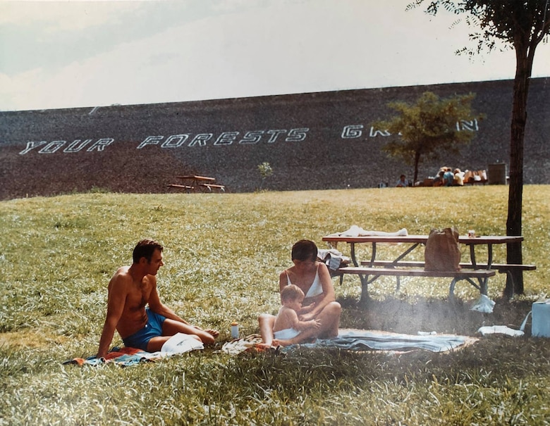 The KEEP YOUR FORESTS GREEN text on Lucky Peak Dam was an extension of the KEEP IDAHO GREEN campaign of the 1950s. The message on the dam was rephrased because Lucky Peak Dam serves the Nation - not just Idaho.