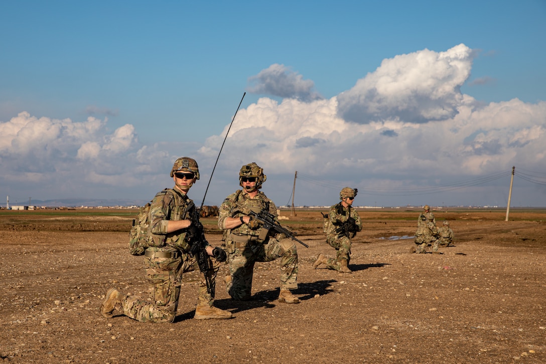U.S. Army Spc. Alex Martin and 1st Lt. Zac Thompson, assigned to Bravo Company, 1st Battalion, 118th Infantry Regiment, 37th Infantry Brigade Combat Team, Combined Joint Task Force - Operation Inherent Resolve, pause for accountability during a patrol, Syria, Feb. 3, 2023. The 118th Infantry Regiment is a part of the U.S. Army National Guard based in South Carolina. (U.S. Army photo by Sgt. Julio Hernandez)