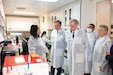 U.S. Ambassador and the Thai Deputy Prime Minister vis a lab at the U.S. Army Medical Directorate - Armed Forces Institute of Medical Sciences.