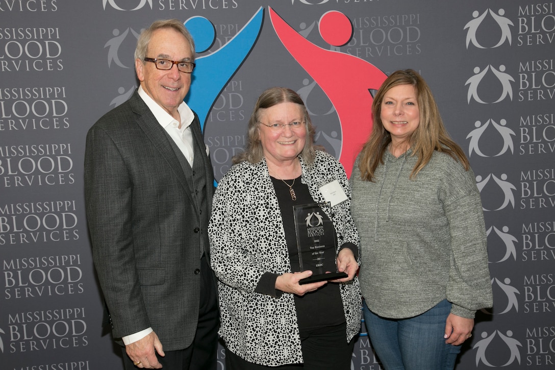 Ruth Osburn and Leslie Grammer, nurses in Health Services at the U.S. Army Engineer Research and Development Center (ERDC), stand with David Allen, chief executive officer of Mississippi Blood Services,