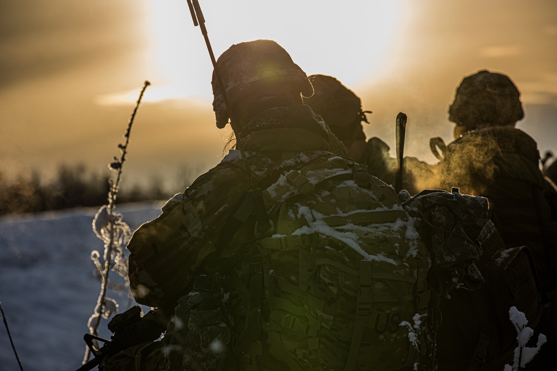 Alaska Army National Guard Infantrymen  assigned to Avalanche Company, 1st Battalion, 297th Infantry Regiment, pull security after a fire fight during a training exercise near Joint Base Elmendorf Richardson Dec. 3, 2022.