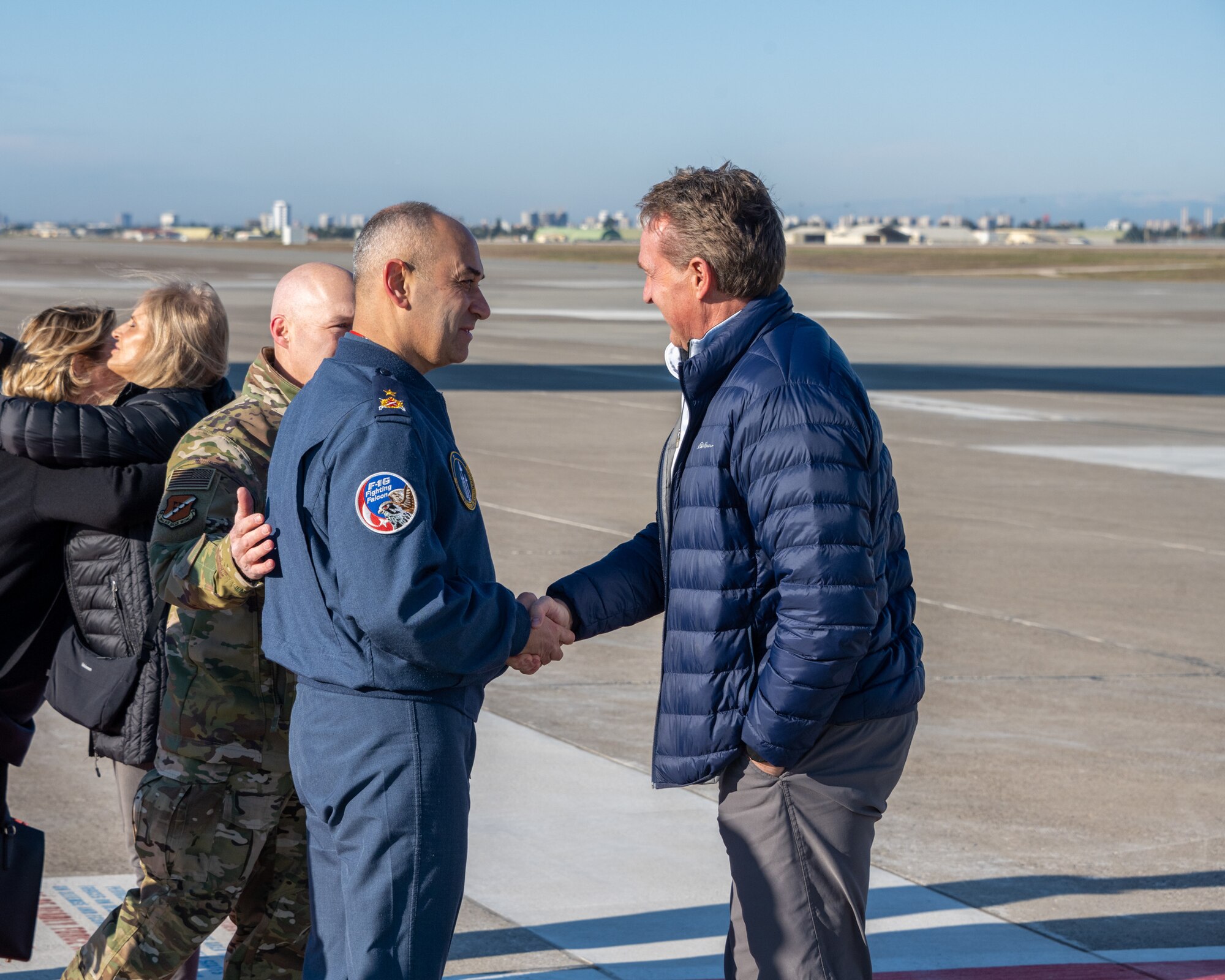 U.S. Ambassador Jeffry Flake, U.S. Ambassador to Türkiye, right, shakes hands with Brig. Gen. Mehmet Serkan Dan, 10th Tanker Base Command commander, left, after his arrival at Incirlik Air Base, Türkiye, Feb 8, 2023. Ambassador Flake visited Incirlik AB to greet members of the United States Agency for International Development’s Disaster Assistance Response Team, following a series of earthquakes that struck central-southern Türkiye on Feb 6, 2023. As Ambassador to Türkiye, Flake holds the highest civilian position as The Chief of Mission, and impacts the communication and resources of U.S. personnel, advancing the U.S. foreign policy goals. As a fellow NATO ally, the U.S. Government mobilized personnel to assist in Türkiye in their response efforts. (U.S. Air Force photo by Senior Airman David D. McLoney)