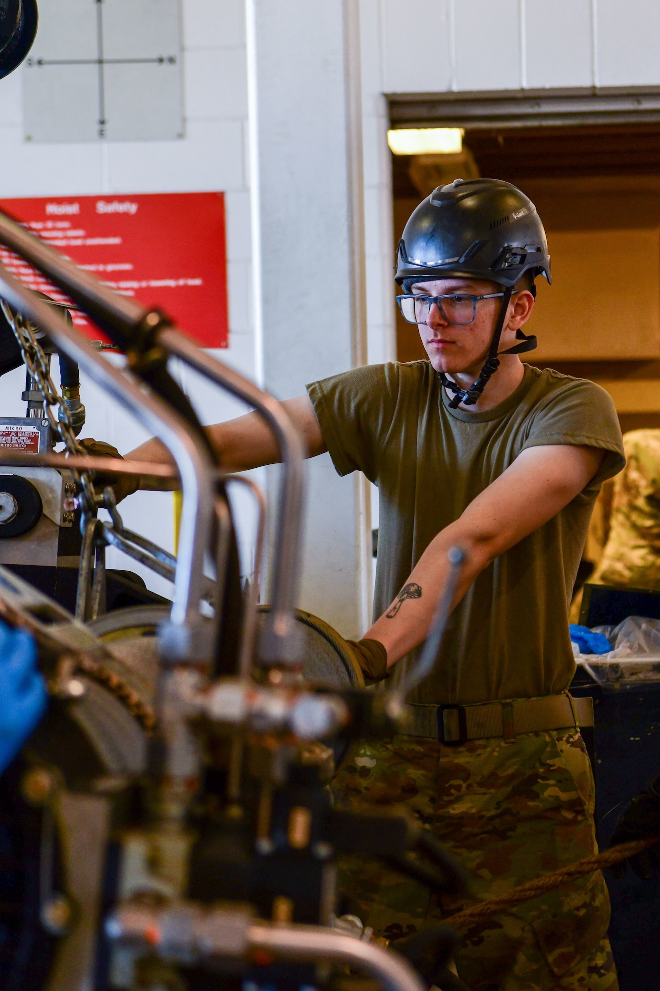 A1C Nathan Boley, 791st Maintenance Squadron assists in performing a Transporter Erector Semitrailer Hoist Assembly replacement with a team of Airmen July 12, 2022, Minot Air Force Base, North Dakota. The 791st MXS help to support Minot Air Force Base’s mission by ensuring the ability to retain our deterrence from our adversaries. (U.S. Air Force photos by Airman Alysa Knott)