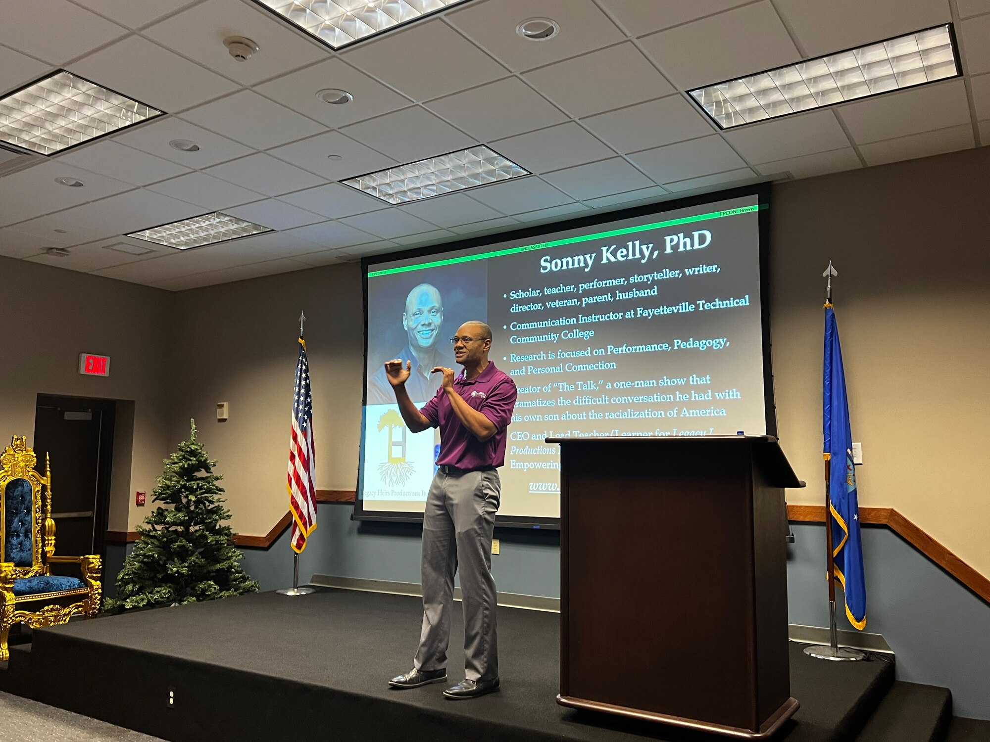 Sonny Kelly speaks to military members