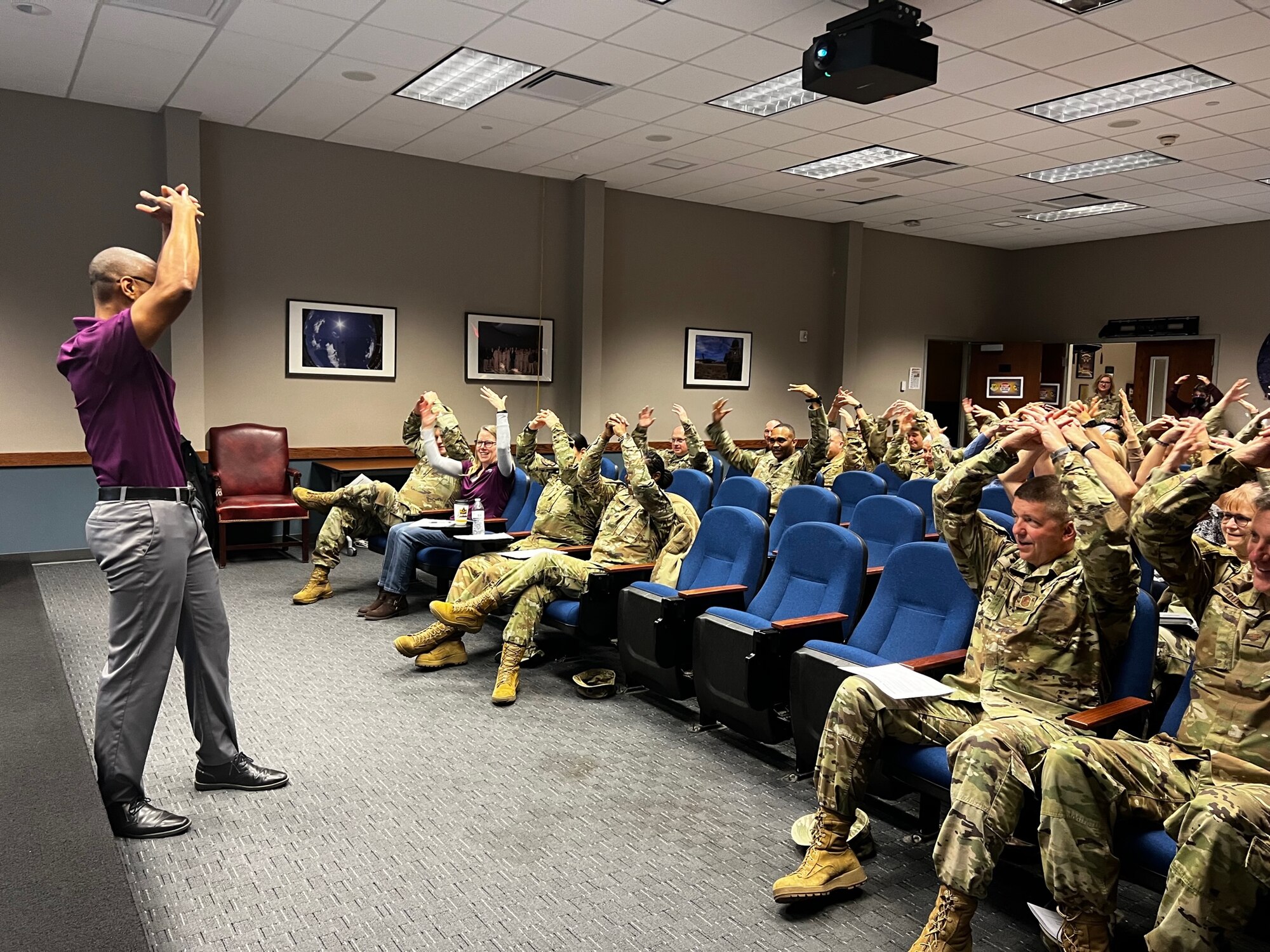 Sonny Kelly speaks to military members