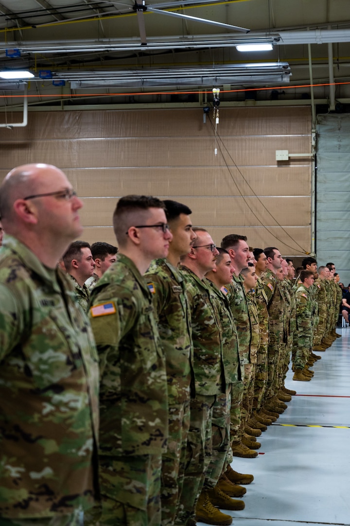 U.S. Army soldiers from the 106th Aviation Regiment take part in a mobilization ceremony at the 182nd Airlift Wing in Peoria, Illinois, February 7, 2023. The 106th Aviation Regiment is part of the Assault Helicopter Battalion and is deploying to the Middle East.