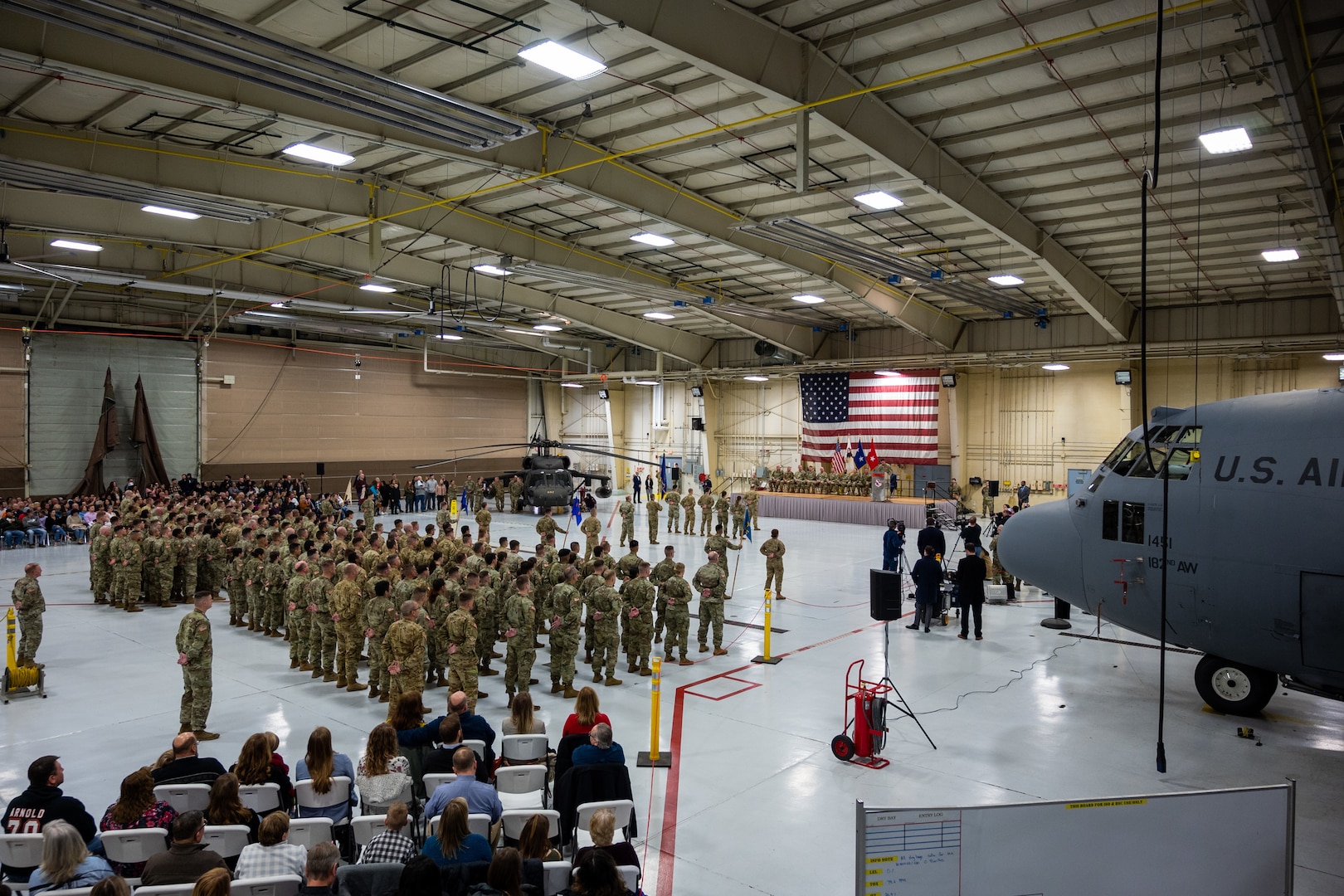 U.S. Army soldiers from the 106th Aviation Regiment take part in a mobilization ceremony at the 182nd Airlift Wing in Peoria, Illinois, February 7, 2023. The 106th Aviation Regiment is part of the Assault Helicopter Battalion and is deploying to the Middle East.