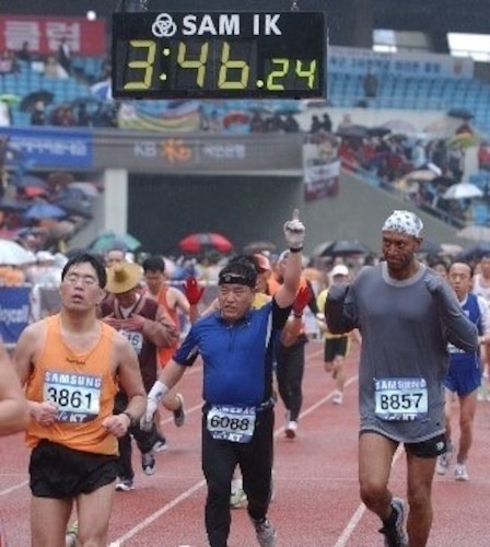 Gary Fowler finishing a marathon.