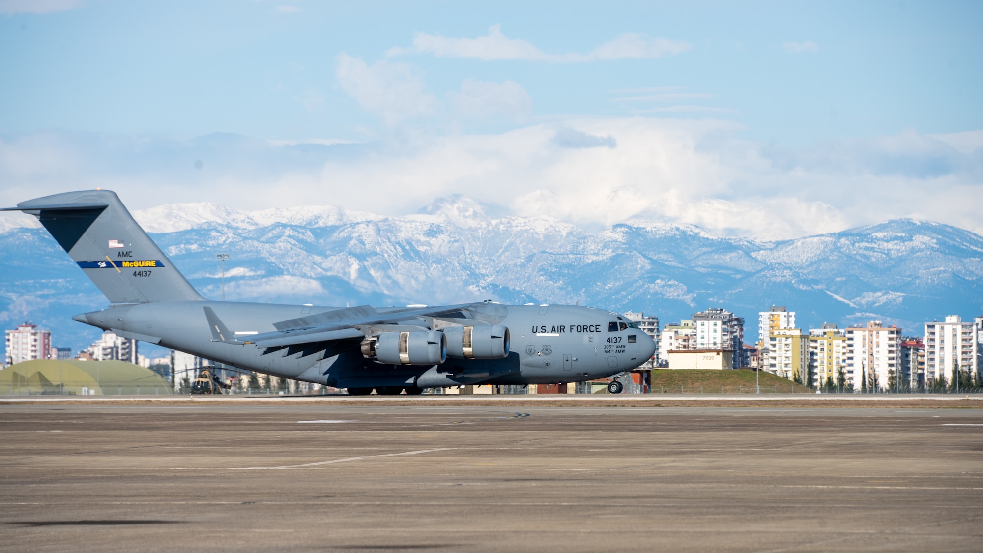 Members of the United States Agency for International Development’s Disaster Assistance Response Team arrive at Incirlik Air Base, Türkiye, Feb. 8, 2023. The DART is assigned to lead the U.S. government humanitarian response following a series of earthquakes that struck central-southern Türkiye on Feb. 6, 2023. The DART includes urban search and rescue teams from the Fairfax and Los Angeles County Fire Departments. The teams are traveling with 159 people, 12 rescue dogs, and 170,000 pounds of specialized equipment. As a fellow NATO ally, the U.S. Government mobilized personnel to assist in Türkiye in their response efforts. (U.S. Air Force photo by Senior Airman David D. McLoney)