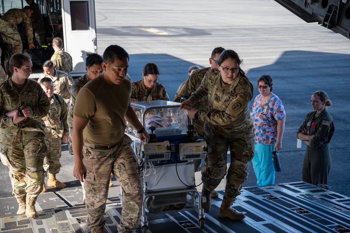 Airmen and soldiers from the 15th Medical Group and Tripler Army Medical Center attend a Neonatal and Critical Care Air Transport Team training at Joint Base Pearl Harbor-Hickam, Hawaii, Feb. 6, 2022. The CCAT team is a highly specialized and uniquely skilled three-person team that specializes in transporting critically injured patients. (U.S. Air Force photo by Senior Airman Makensie Cooper)