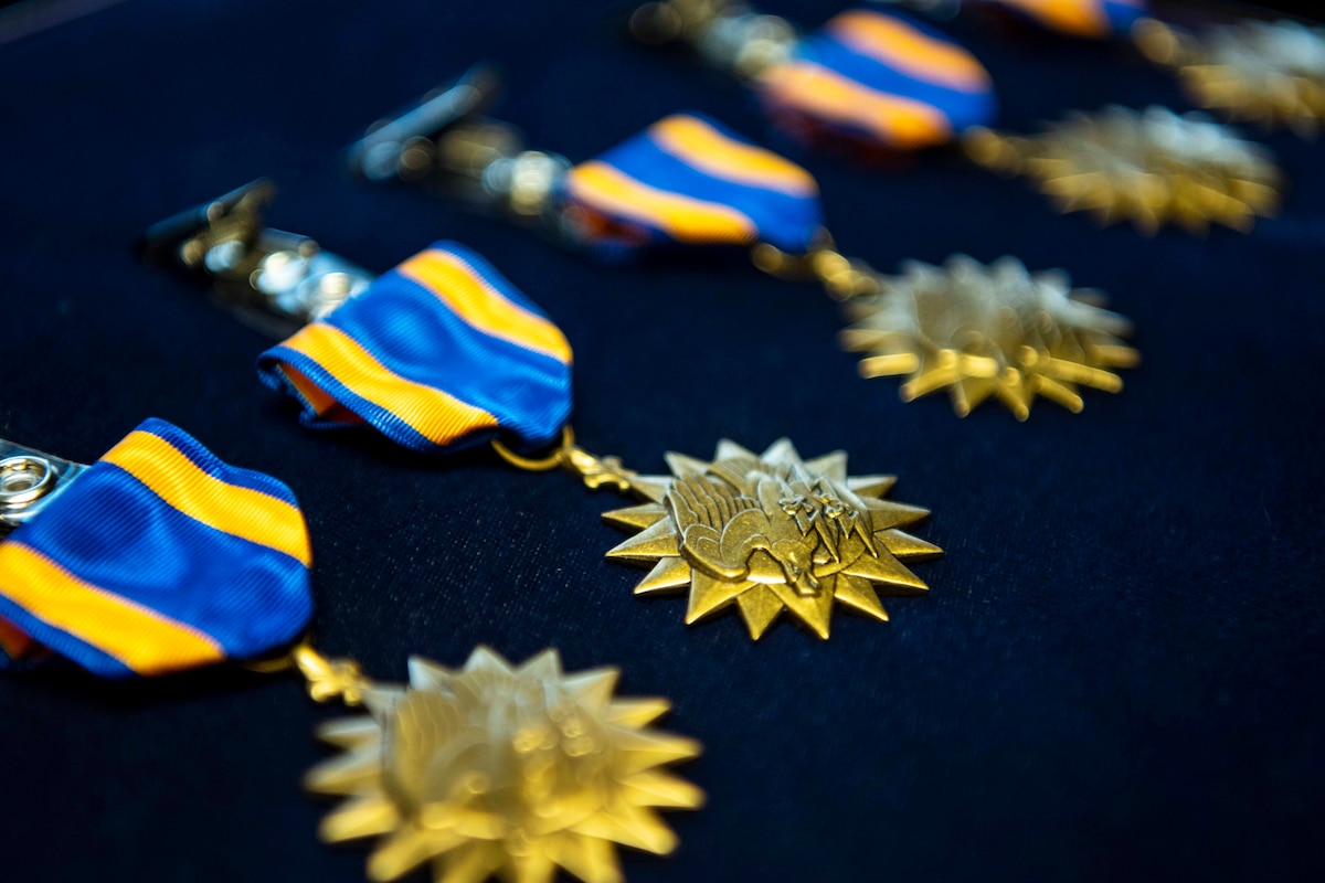 Air Medals sit on display in a row.