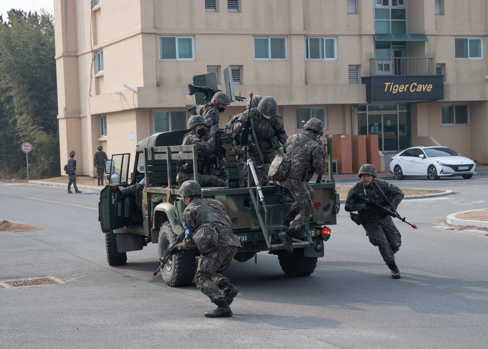 Republic of Korea (ROK) Air Force 38th Fighter Group military policemen disembark from a truck during a training event at Kunsan Air Base, ROK, Feb. 7, 2023. During the training event, and the 38th FG worked together with the U.S. Air Force 8th Security Forces Squadron to strengthen their interoperability. (U.S. Air Force photo by Senior Airman Akeem K. Campbell)