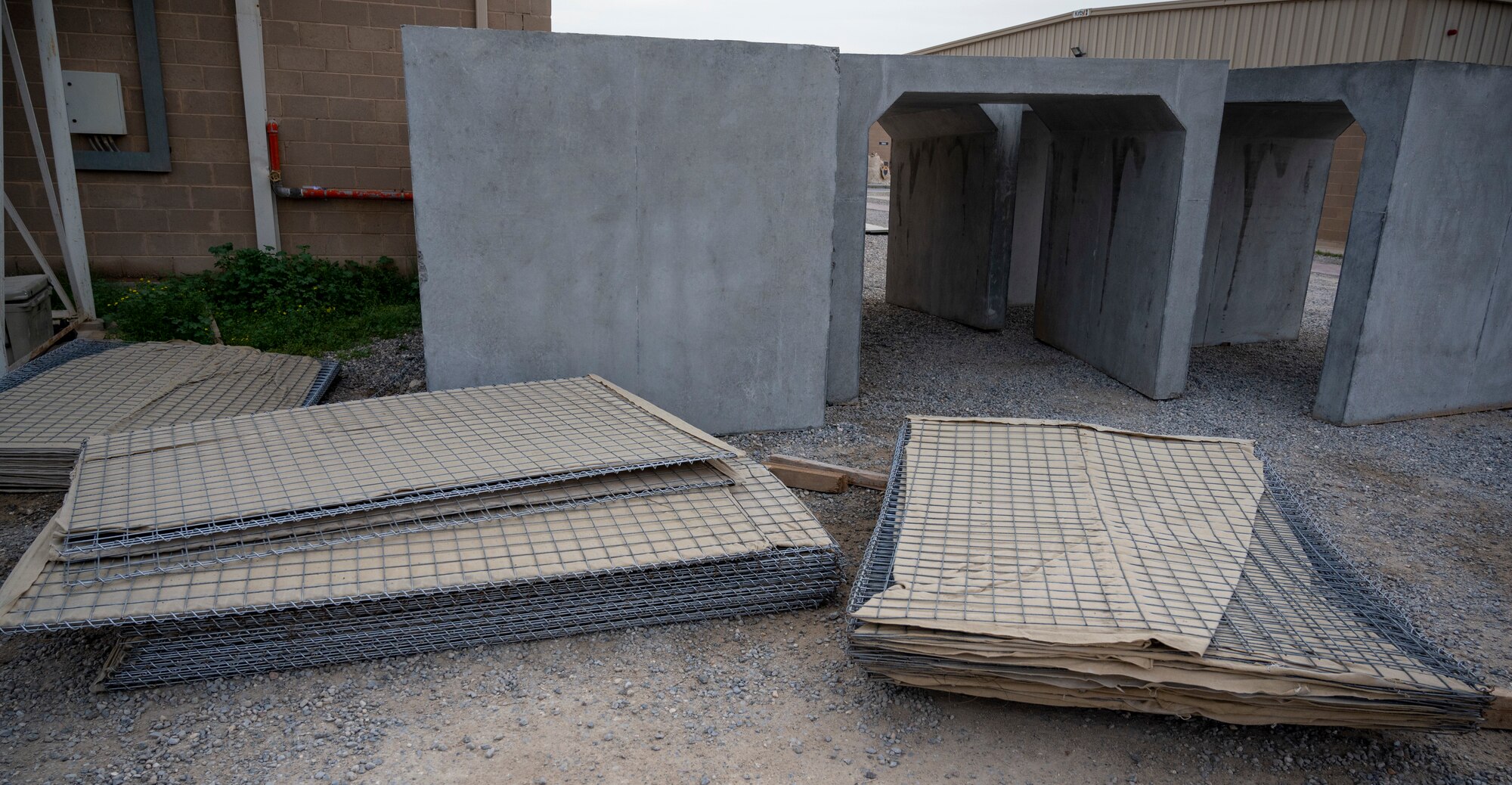 Supplies are prepared to be made into a new bunker at Ali Al Salem Air Base, Kuwait, Feb. 7, 2023.