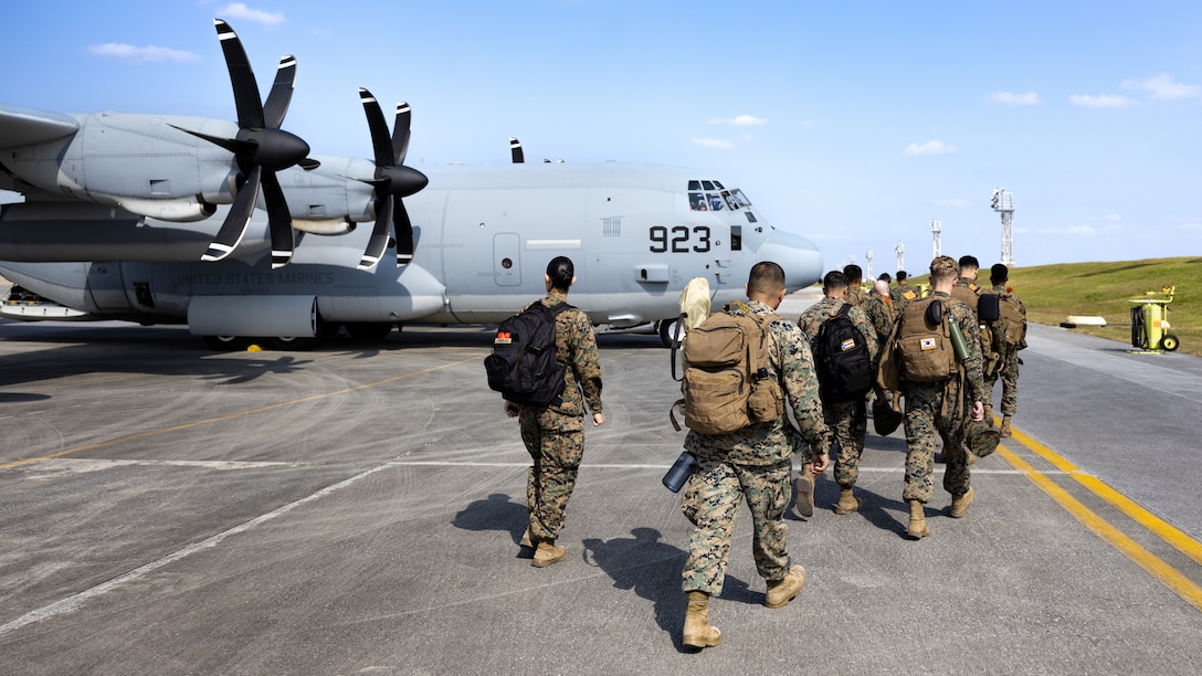 U.S. Marines with III Marine Expeditionary Force Support Battalion, III Marine Expeditionary Force Information Group, board a C-130J Super Hercules on Kadena Air Force Base, Okinawa, Japan, Jan. 20, 2023. III MSB sent a small quartering party to prepare the main body movement prior to Bushido Strike 23, a training event in South Korea where III MSB will conduct their Marine Corps Combat Readiness Evaluation to validate its mission essential tasks to provide combat service support, and administrative services to III Marine Expeditionary Force.