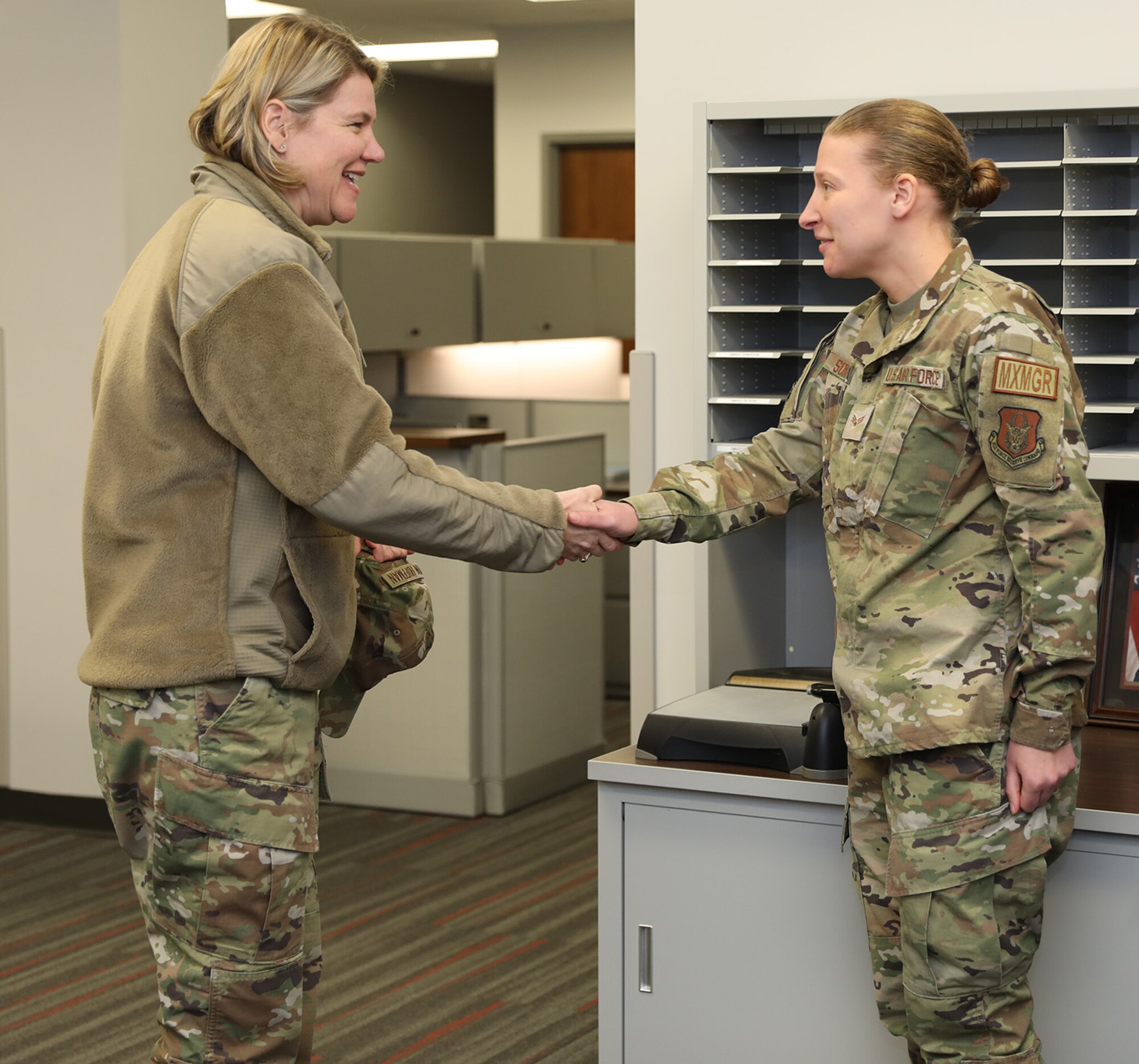 Maj. Gen. C. McCauley von Hoffman is the Director of Logistics, Civil Engineering, Force Protection and Nuclear Integration, Headquarters Air Force Materiel Command, coins Senior Airman Samantha Schinker, 445th Maintenance Group maintenance operations, maintenance management analysis journeyman, for being an outstanding performer Jan. 8, 2023. Five Airmen were coined by the general for being their group’s outstanding performer; three from the 445th Maintenance Group and two from the 445th Mission Support Group. While at the wing, the general received an overview briefing from both the 445th MSG and MXG, she met with 21X officers during a senior leader perspective discussion, had lunch with both 445th MXG and MSG leadership and toured various maintenance facilities.
