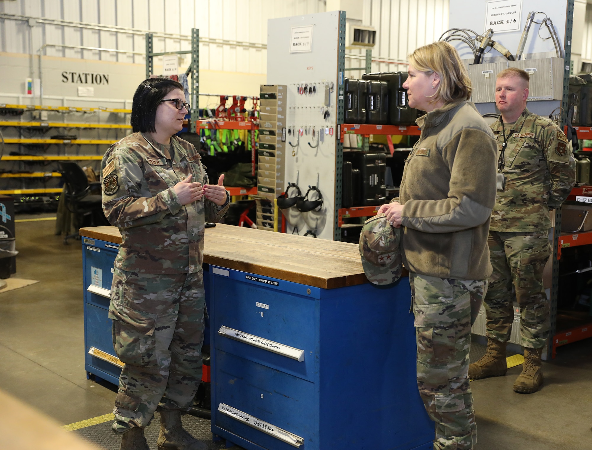 Tech. Sgt. Candra Fisher, 445th Aircraft Maintenance Squadron aircraft maintenance technician and equipment custodian for the 445th AMXS tool room, talks to Maj. Gen. C. McCauley von Hoffman, Director of Logistics, Civil Engineering, Force Protection and Nuclear Integration, Headquarters Air Force Materiel Command about her Custodian Authorization Custody Receipt Listing (CA/CRL) account, issues with getting equipment in and the unit’s Getacs (fully rugged laptop used as the standard mobile device for munitions management) and the problems they have been experiencing with them. While at the wing, the general received an overview briefing from both the 445th Mission Support Group and 445th Maintenance Group, she met with 21X officers during a senior leader perspective discussion, had lunch with both 445th MXG and MSG leadership and toured various maintenance facilities. Five Airmen, two from MSG and three from MXG, were coined by the general for being their group’s outstanding performer.