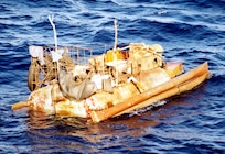 Florida Straits -- A raft which Cuban migrants were found aboard and picked up by the U.S. Coast Guard. The "hull" of this raft was made from an old fuel tank. USCG photo by SMITH, CHARLES PA1