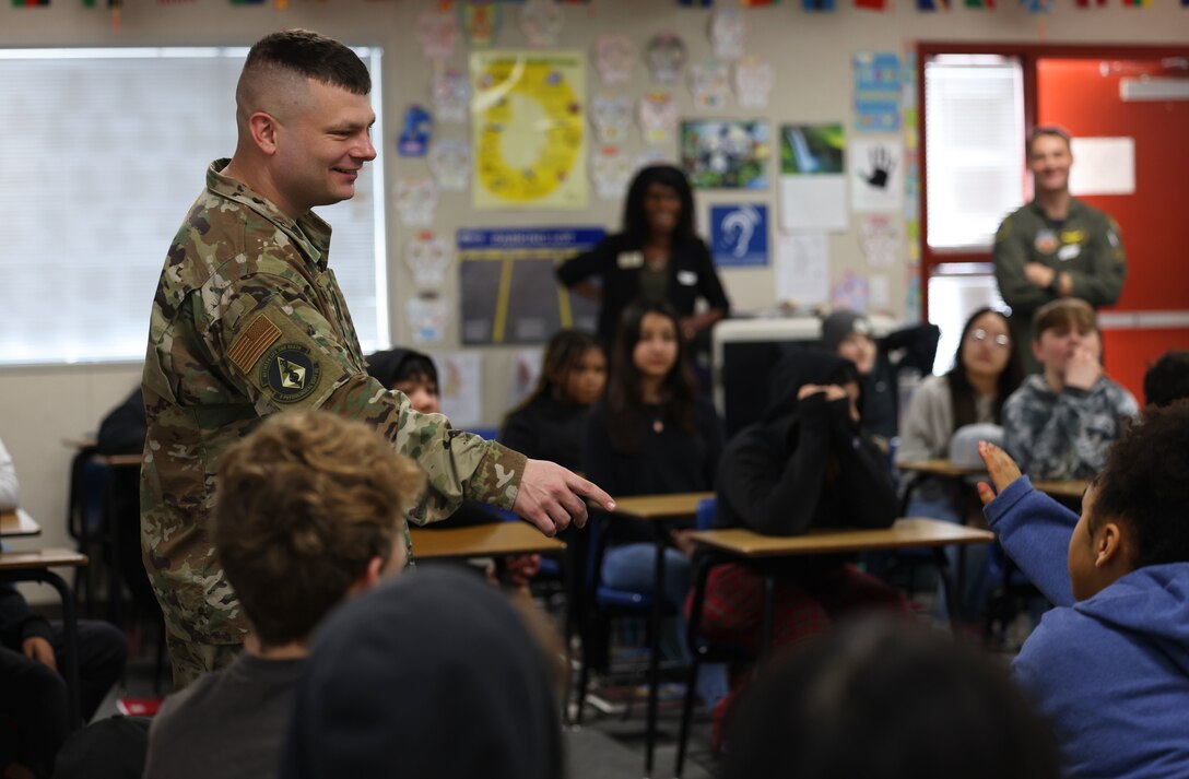 U.S. Air Force Tech. Sgt. Jeffrey Grant, 9th Physiological Support Squadron NCO in charge of U-2 operations, briefs 8th grade students Feb. 3, 2023, at Anna McKinney Intermediate School, Marysville, Calif.