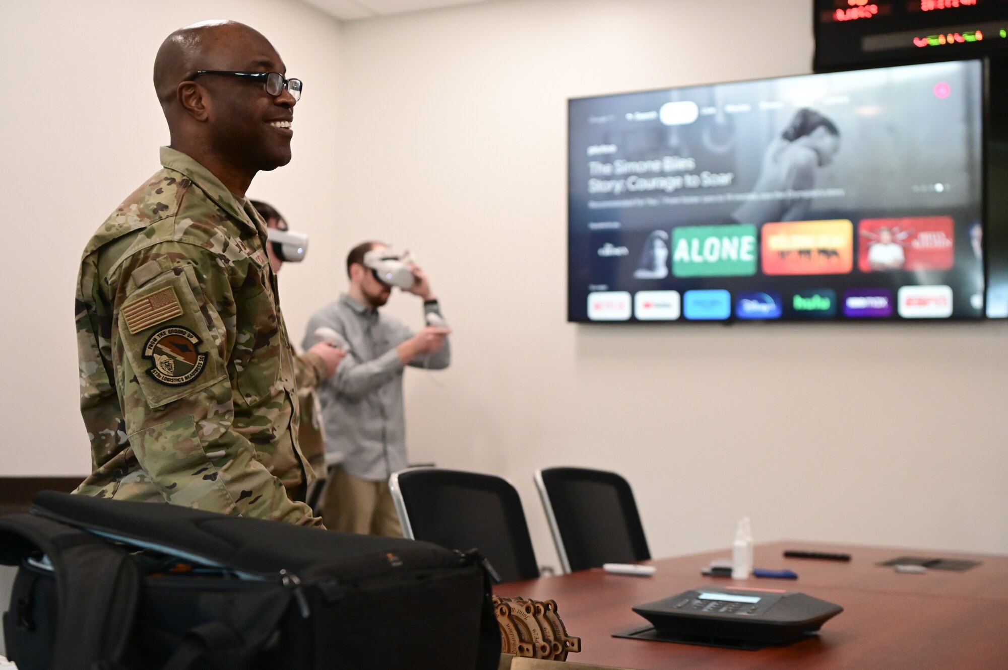 U.S. Air Force Lt. Col. George Okorowdudu, the 673d Logistics Readiness Squadron commander, visits the 673d LRS to talk to the developers of a new Virtual Reality Training tool at Joint Base Elmendorf-Richardson, Alaska, Jan. 31 2023.