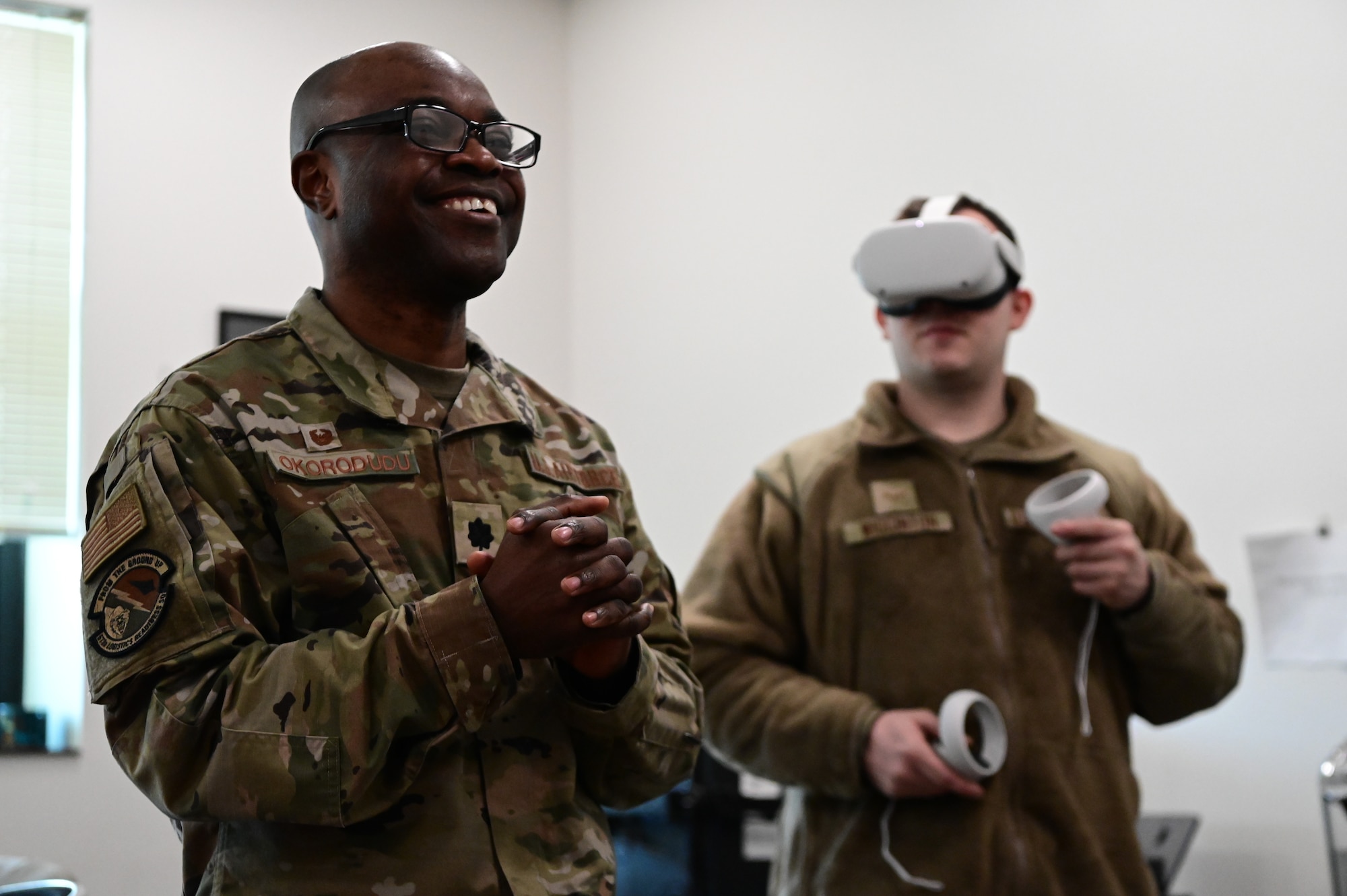 U.S. Air Force Lt. Col. George Okorowdudu, the 673d Logistics Readiness Squadron commander, visits the 673d LRS to talk to the developers of a new Virtual Reality Training tool at Joint Base Elmendorf-Richardson, Alaska, Jan. 31 2023.