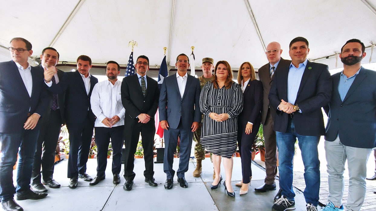 (Left to Right) Pedro Pierluisi, Governor, Puerto Rico (Center Right), Michael L. Connor, Assistant Secretary of the Army for Civil Works (Center Left), COL James Booth, Commander, USACE Jacksonville District (second center right), Jeniffer Gonzalez, Congresswoman Puerto Rico, partners and stakeholders. (USACE photo by Luis Deya)