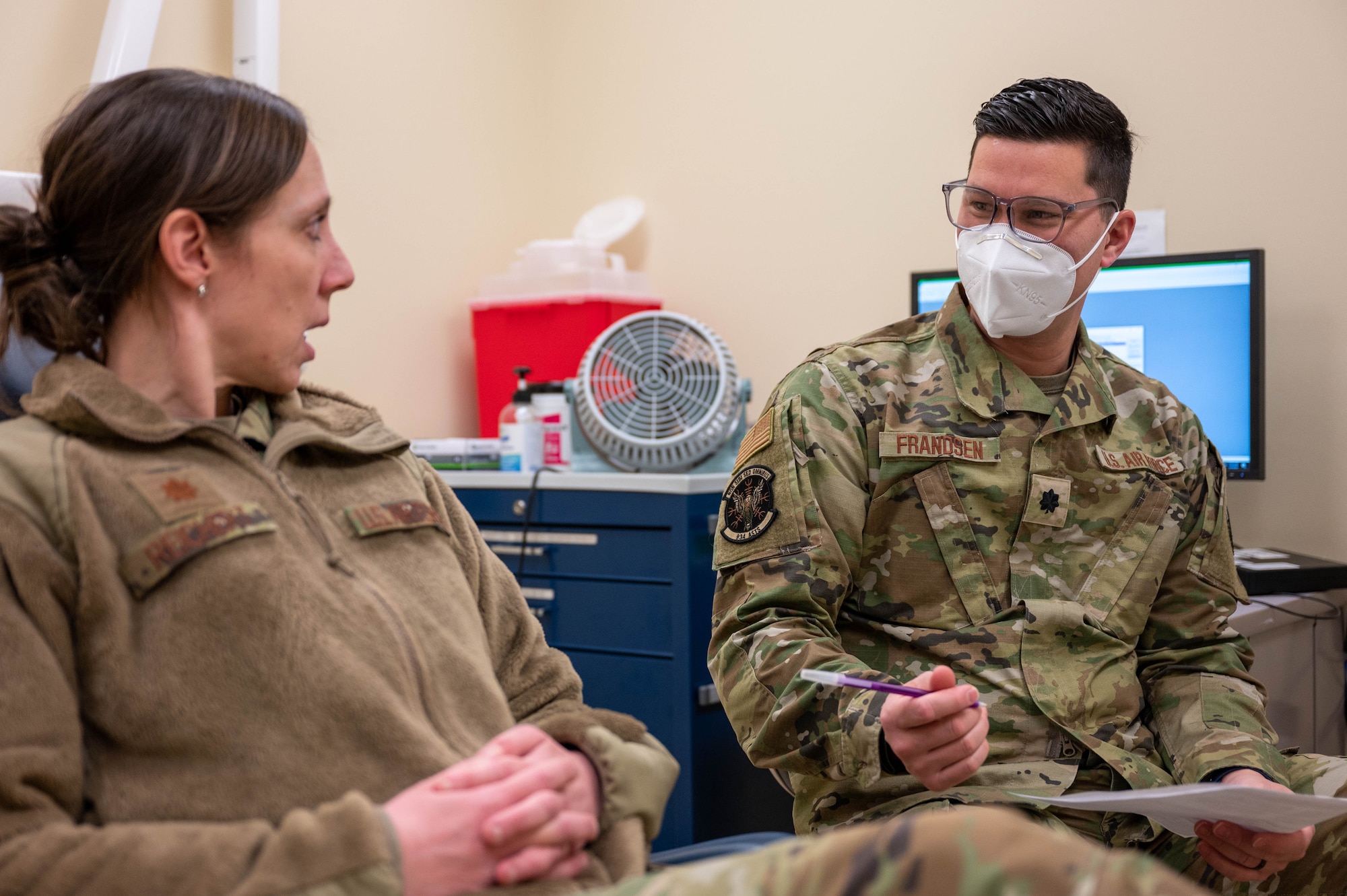 Lt. Col. Peter Frandsen, the 934th Aeromedical Staging Squadron chief of dental services, right, examines a patient, Maj. Katherine Reichert, the 934th ASTS patient safety program manager, at the Minneapolis-Saint Paul Air Reserve Station, February 4, 2023. The dental component is an integral part of the medical readiness process during tri-annual, temporary duty and deployment due exams. (U.S. Air Force photo by Staff Sgt. Timothy Leddick)