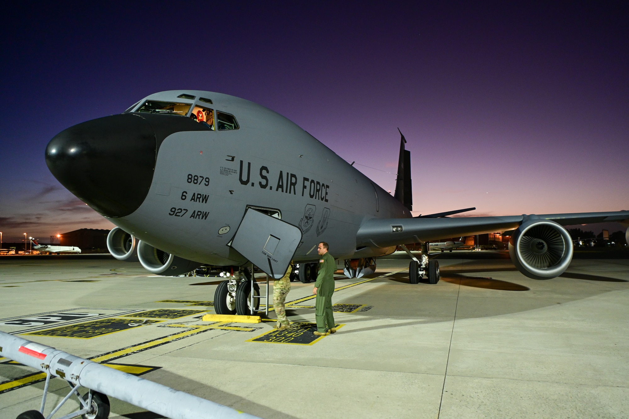 A KC-135 Stratotanker sits on the flight line as the sun goes down, Cape Town, South Africa, Jan. 25, 2023. This aircraft participated in Operation Vespucci, the first time two aircraft from two different units across the continental United States circumnavigated the Southern Hemisphere together. (U.S. Air Force photo by 2nd Lt. Kristin Nielsen)