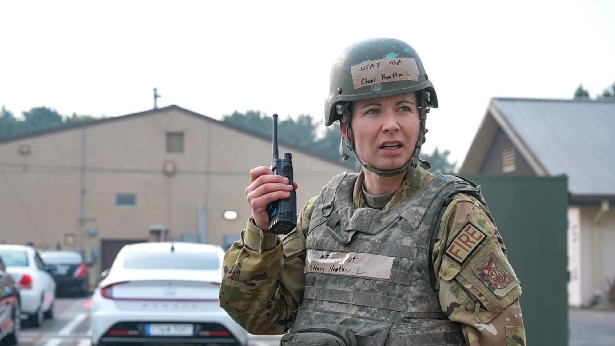 U.S. Air Force Master Sgt. Heather Clear, 8th Civil Engineer Squadron fire and emergency services flight deputy chief, controls the scene during a training event with the Republic of Korea (ROK) 38th Fighter Group at Kunsan Air Base, Republic of Korea, Feb. 7, 2023. Working bilaterally during training helps each unit further enhance their mutual support processes in the event that they need to respond as a team in real-world emergencies. (U.S. Air Force photo by Staff Sgt. Sadie Colbert)