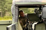 Washington National Guard Spc. Brady Dickinson with Charlie Company, 898th Brigade Engineer Battalion, 81st Stryker Brigade Combat Team, sets up long-range, mobile antenna systems on Joint Base Lewis-McChord, Wash., Feb. 4, 2023. The retransmitting teams and their equipment were sling-loaded to strategic battlefield locations by a CH-47 Chinook crewed by 1st Battalion, 168th General Support Aviation Regiment.