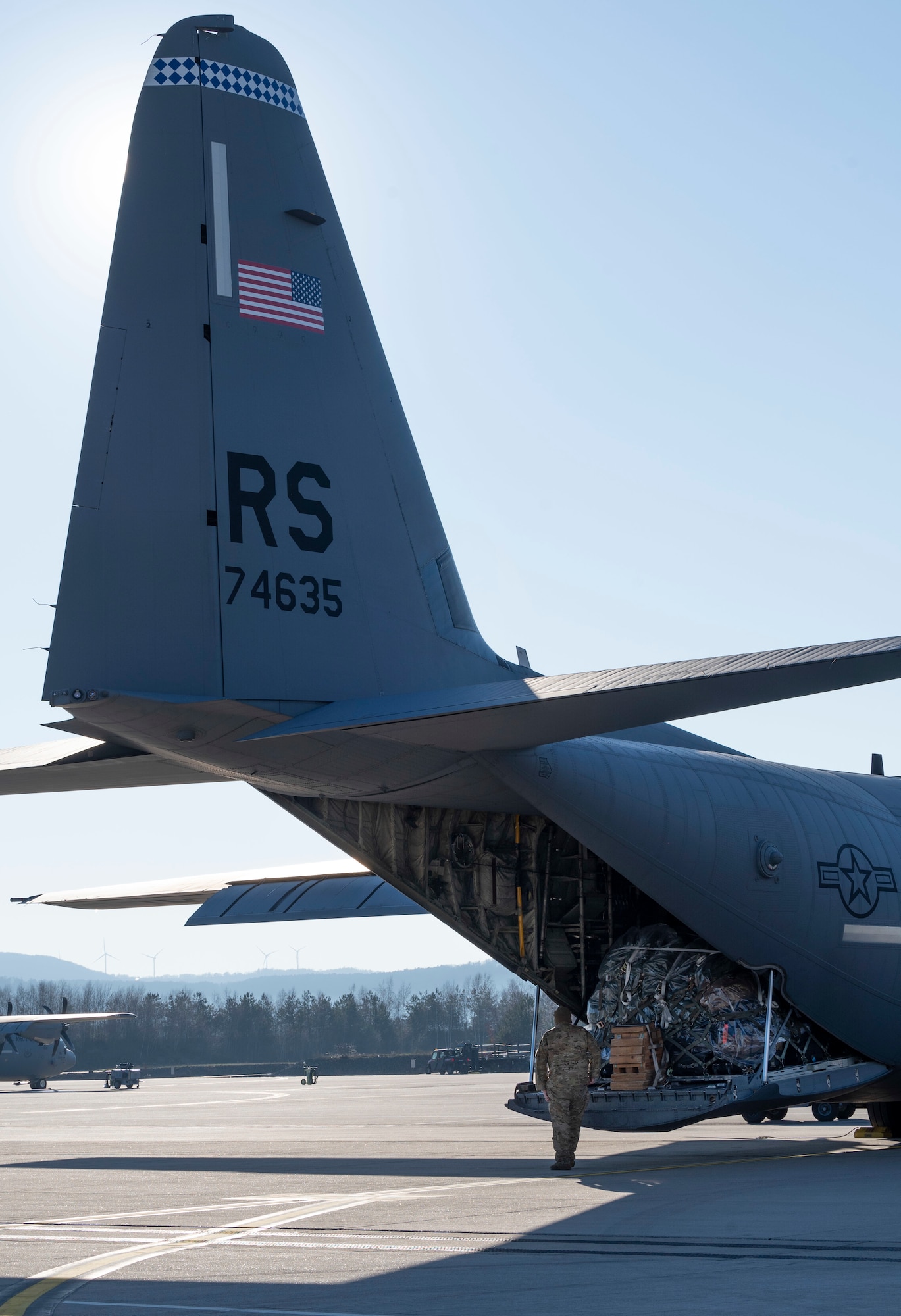 A U.S. Air Force C-130J Super Hercules aircraft from the 37th Airlift Squadron and members of Team Ramstein prepare to take off at Ramstein Air Base, Germany, to aid in earthquake recovery efforts out of Incirlik Air Base, Türkiye, Feb. 8, 2023.